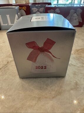Lladro Porcelain Bell Ornament with Red Bow and Raised Motifs